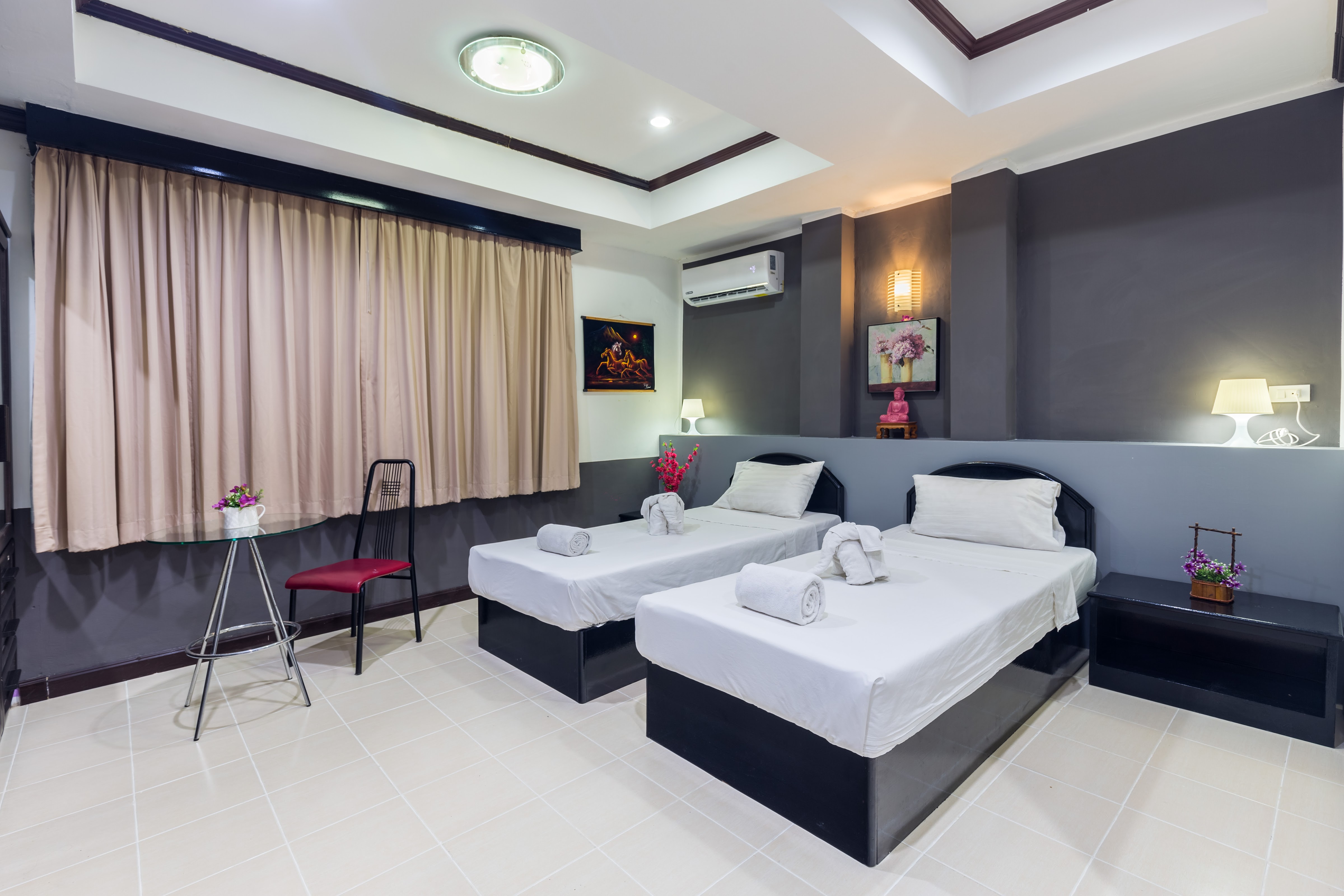 Grand Orchid inn Hotel